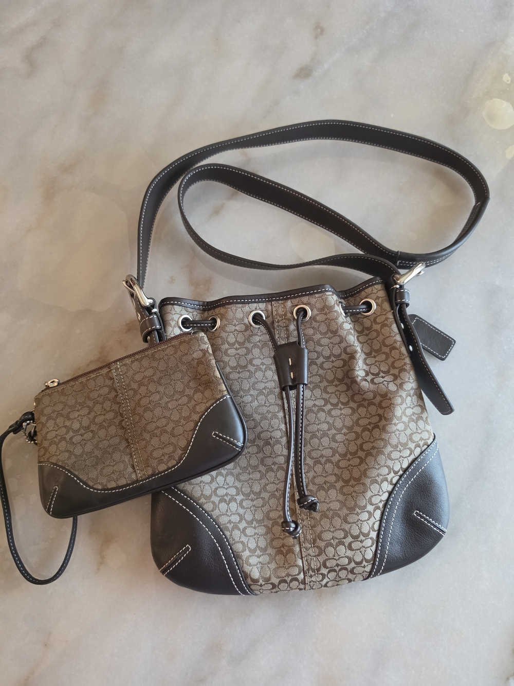 Coach Signature Drawstring Crossbody Bag in Brown